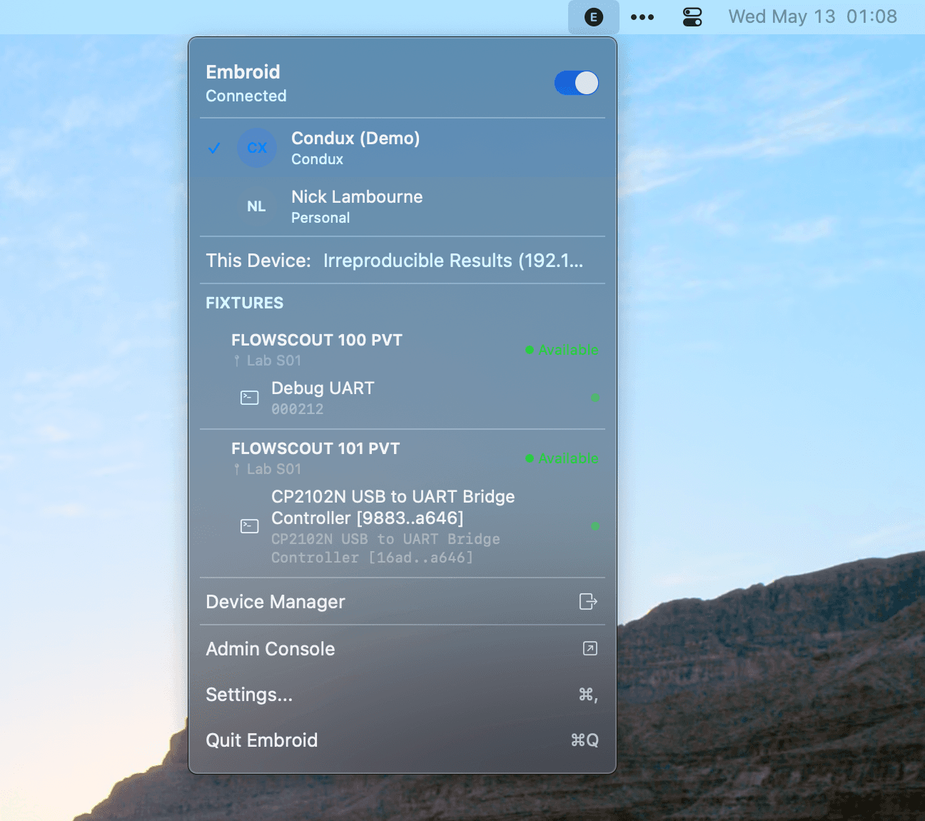 Embroid Client menu bar app on macOS, shows connection status, account, and discovered fixtures including FLOWSCOUT boards and a CP2102N USB-to-UART bridge.